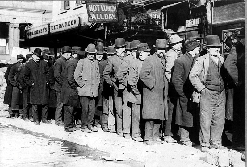 Bowery men waiting for bread in bread line, New York City, Bain Collection
